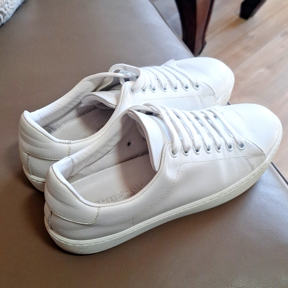 Burberry plain white sneakers. Clean and minor scratch. Worn a handful of times!